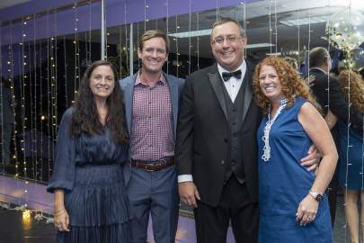 Genevieve and Beau George with Board President Steve and Heather Swindler